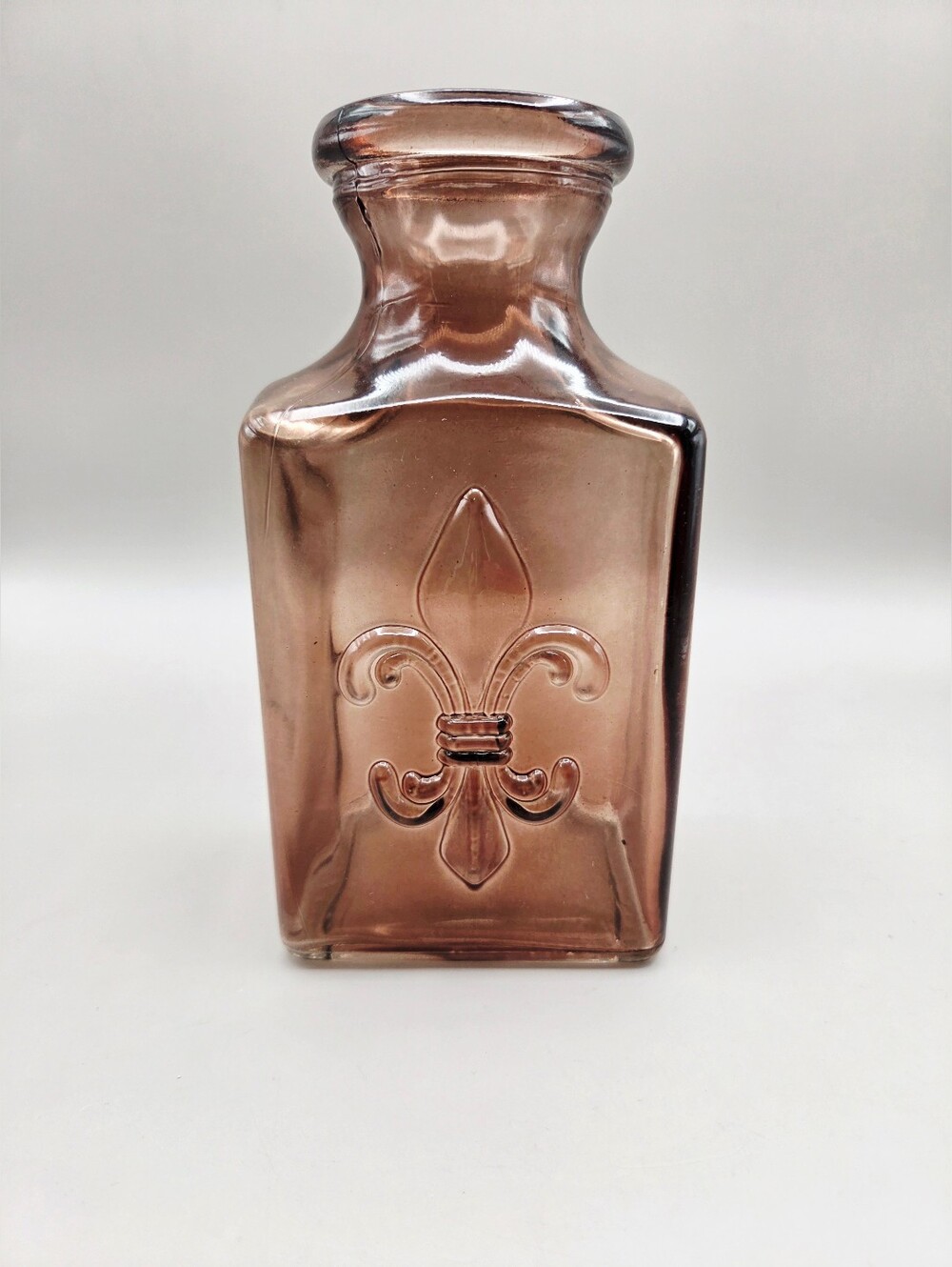 Fleur-de-Lis Decorative Amber Glass Bottle